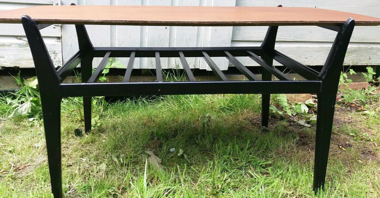 MCM Nathan ebonised leg Tola coffee table with magazine rack