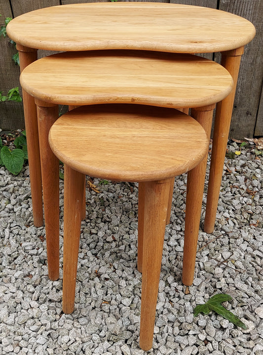 MCM kidney shaped oak nest of tables