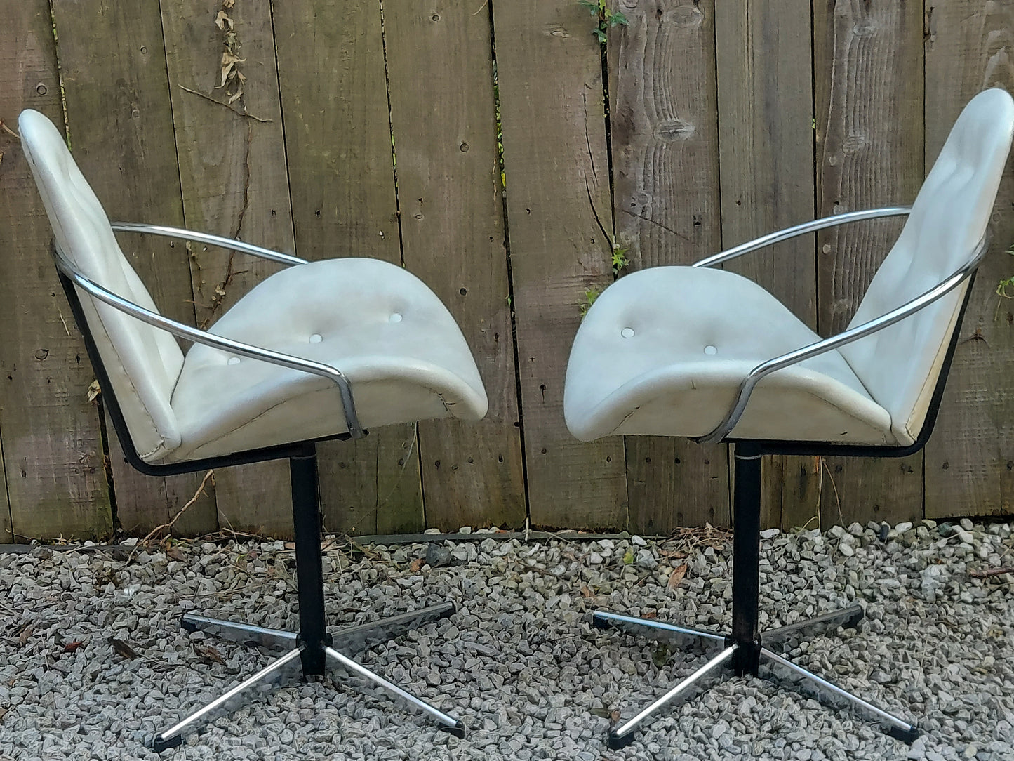 mid century modern pair atomic style cream vinyl swivel chairs