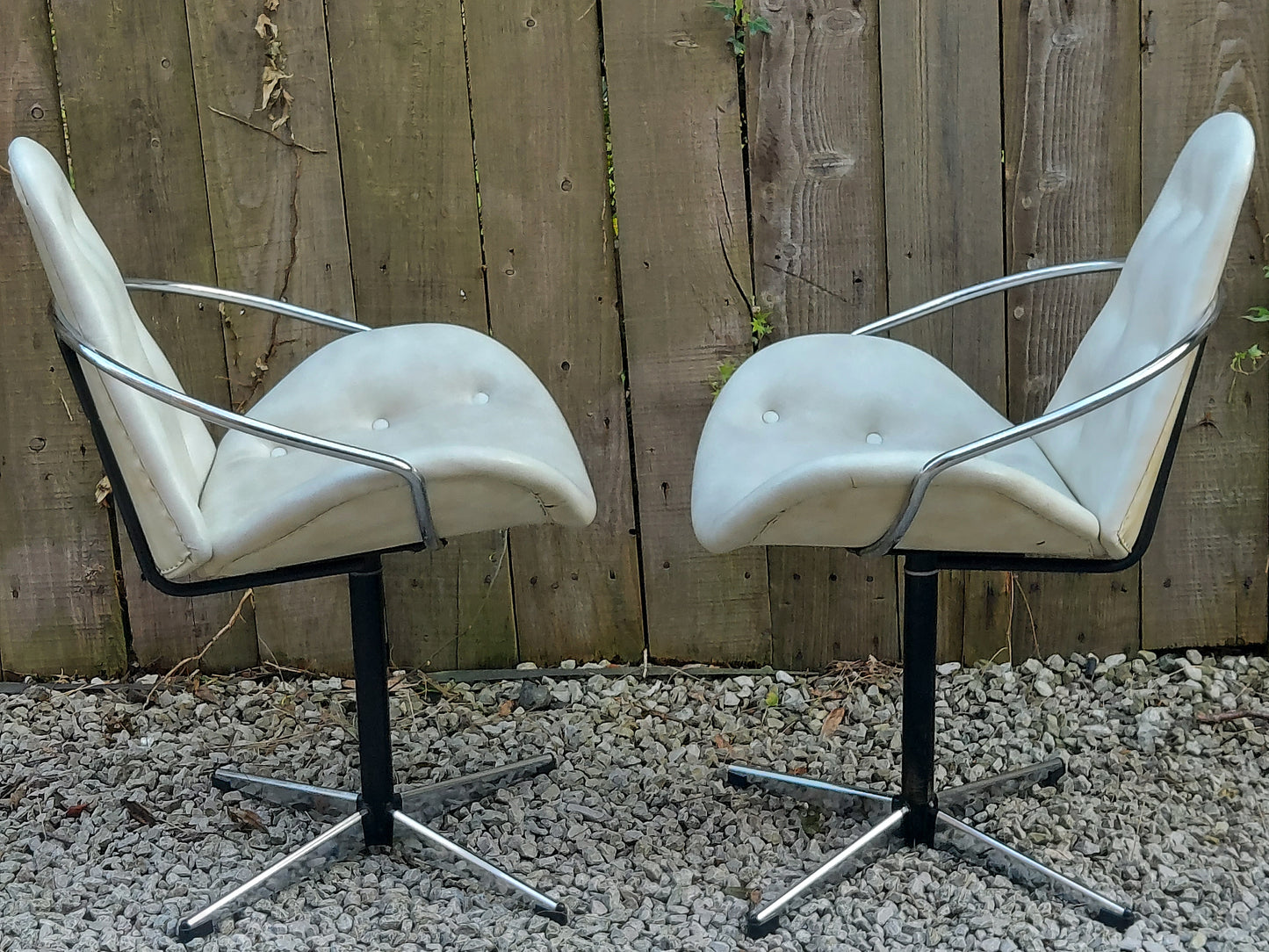 mid century modern pair atomic style cream vinyl swivel chairs