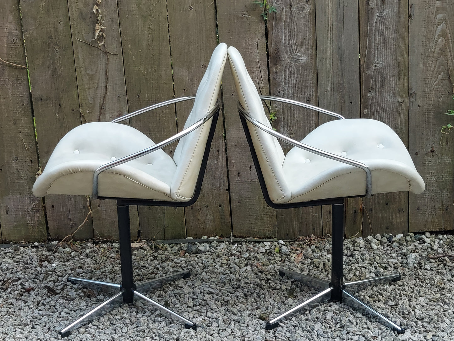 mid century modern pair atomic style cream vinyl swivel chairs