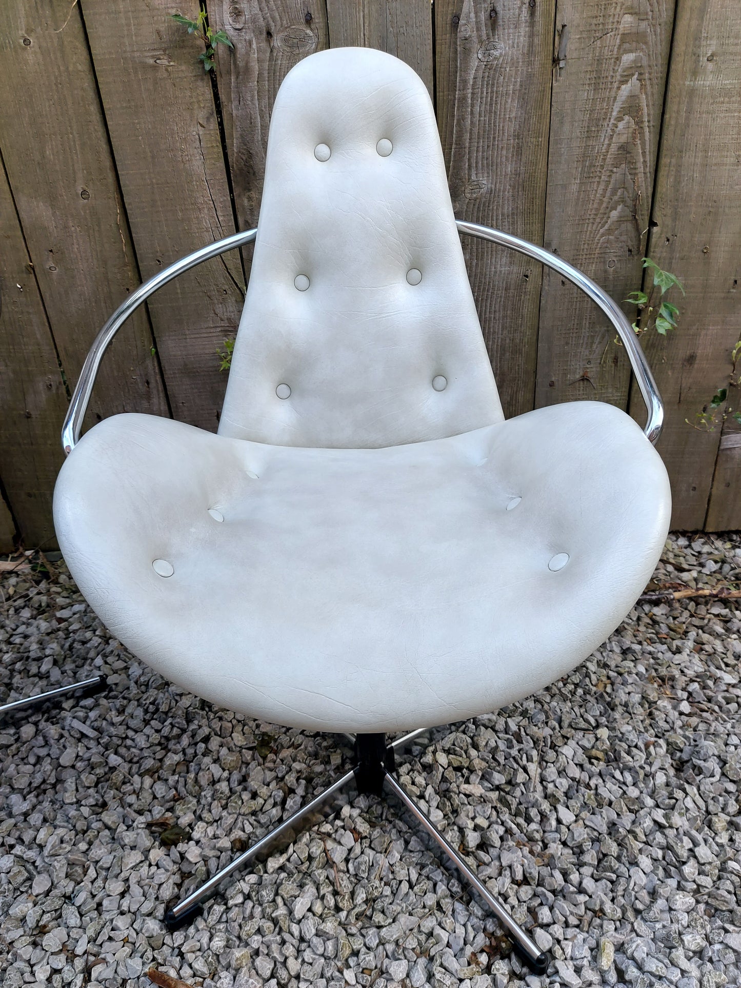 mid century modern pair atomic style cream vinyl swivel chairs