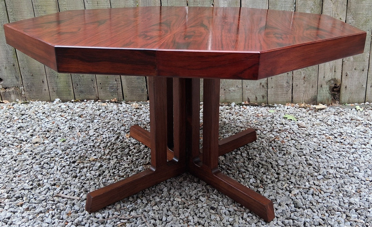 MCM Johannes Andersen octagonal rosewood dining table produced by Hans Bech