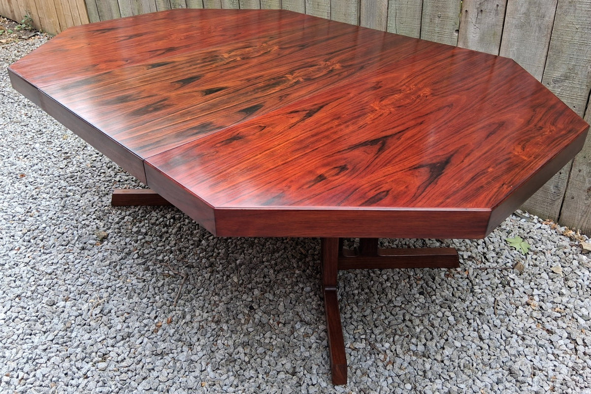 MCM Johannes Andersen octagonal rosewood dining table produced by Hans Bech