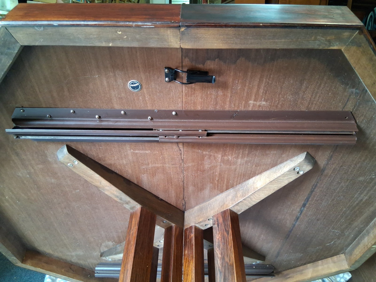 MCM Johannes Andersen octagonal rosewood dining table produced by Hans Bech