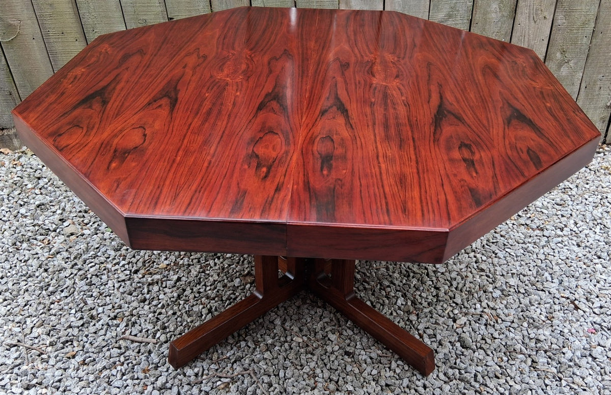 MCM Johannes Andersen octagonal rosewood dining table produced by Hans Bech