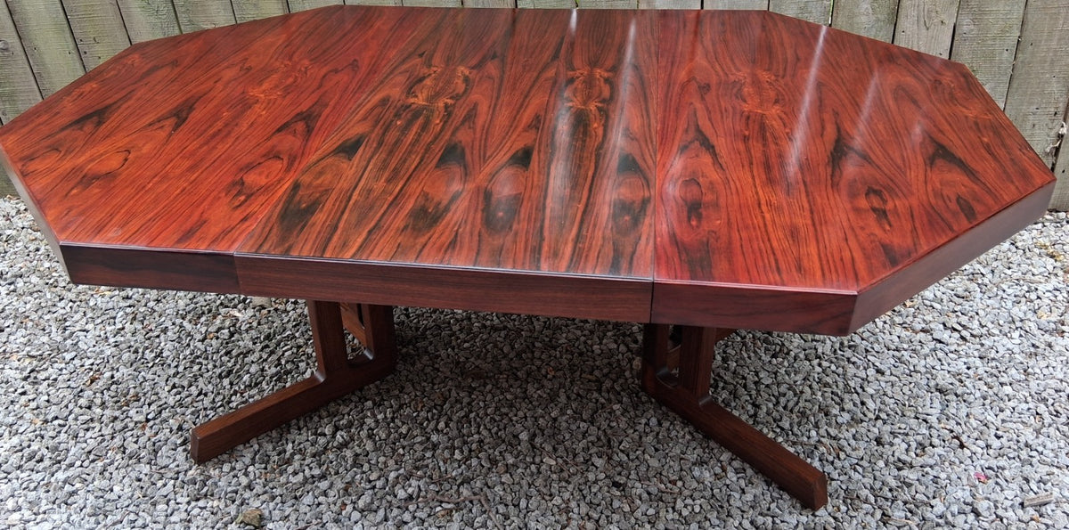 MCM Johannes Andersen octagonal rosewood dining table produced by Hans Bech