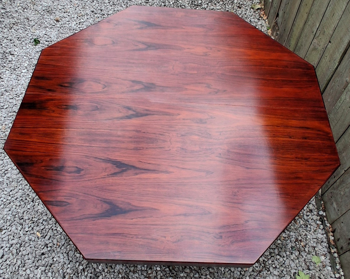 MCM Johannes Andersen octagonal rosewood dining table produced by Hans Bech