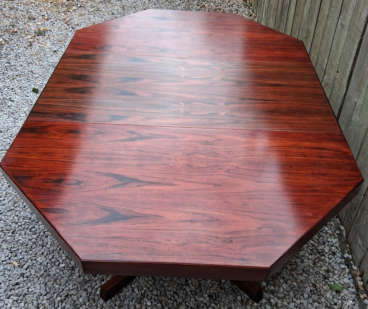 MCM Johannes Andersen octagonal rosewood dining table produced by Hans Bech