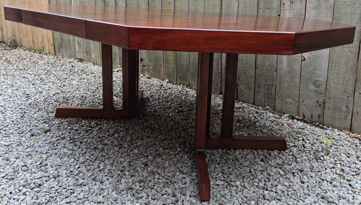 MCM Johannes Andersen octagonal rosewood dining table produced by Hans Bech