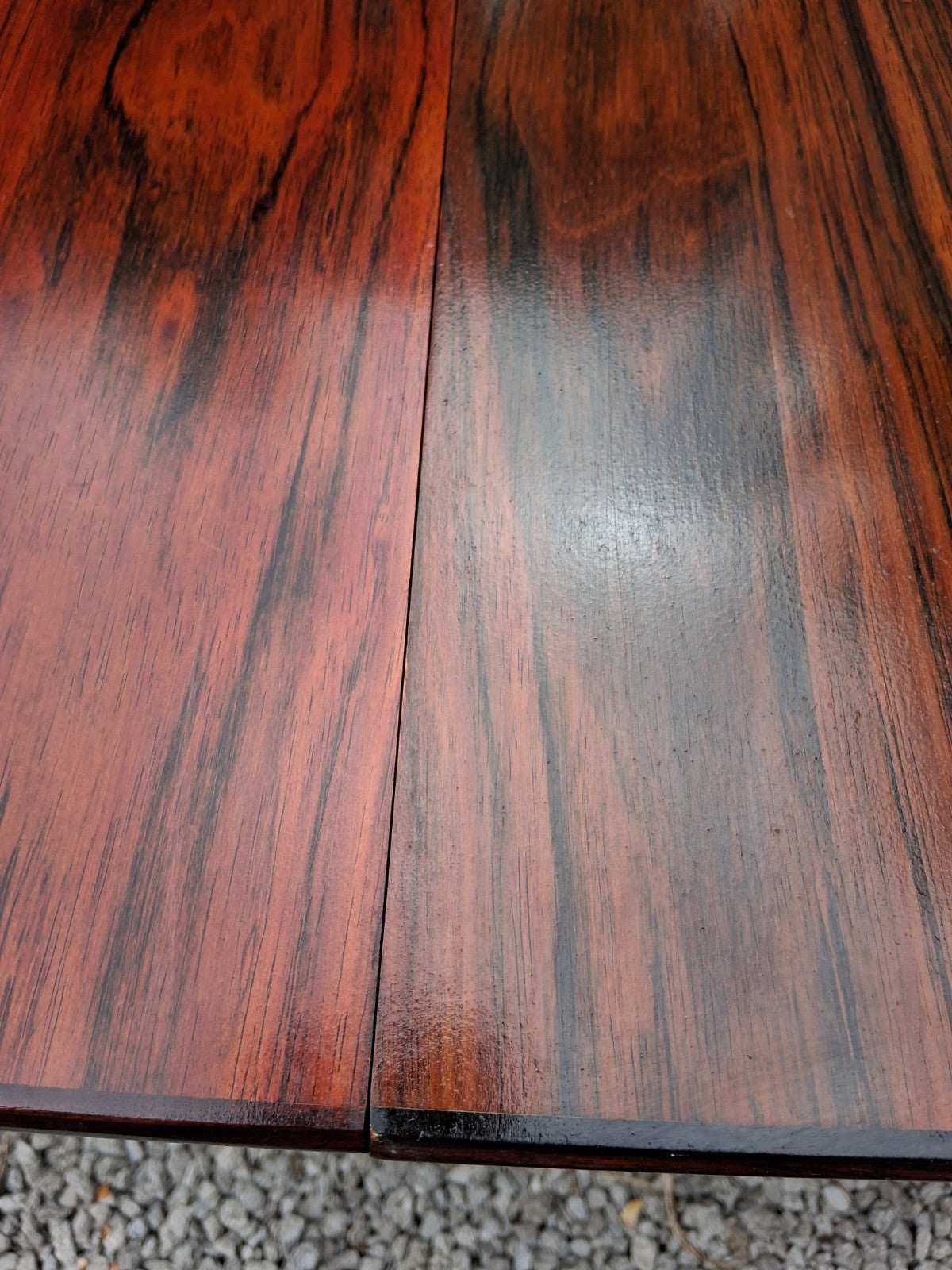 MCM Johannes Andersen octagonal rosewood dining table produced by Hans Bech