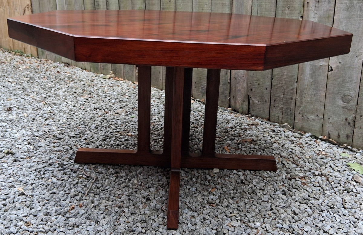 MCM Johannes Andersen octagonal rosewood dining table produced by Hans Bech