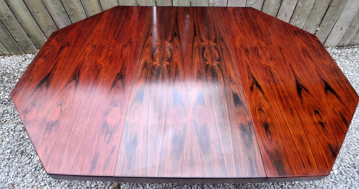 MCM Johannes Andersen octagonal rosewood dining table produced by Hans Bech